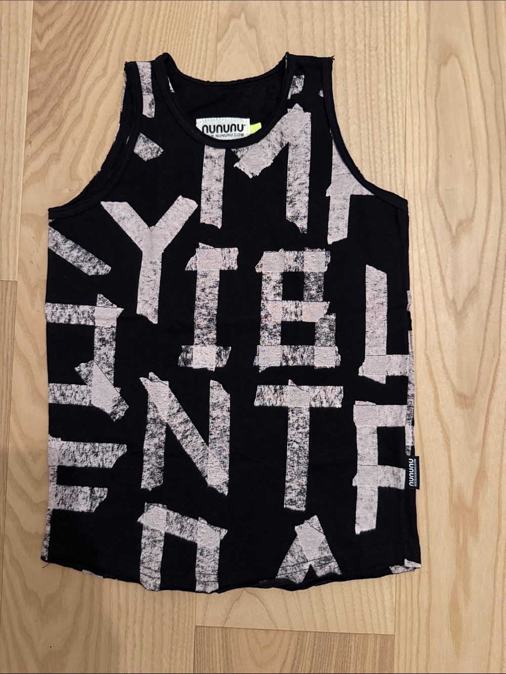 nununu alphabet tank top. black and white. 100% cotton. size 6-7. like new.